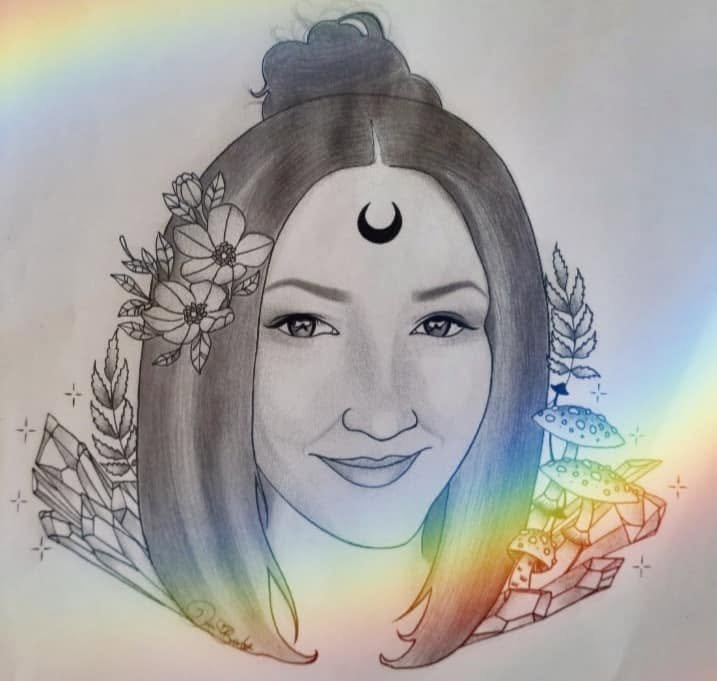 Pencil portrait of a smiling woman with a top knot and a crescent moon on her brow, flowers, mushrooms and crystals drawn around her